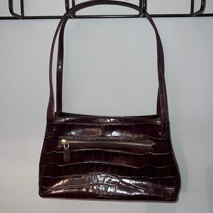 Monsac reddish brown crocodile leather bag.